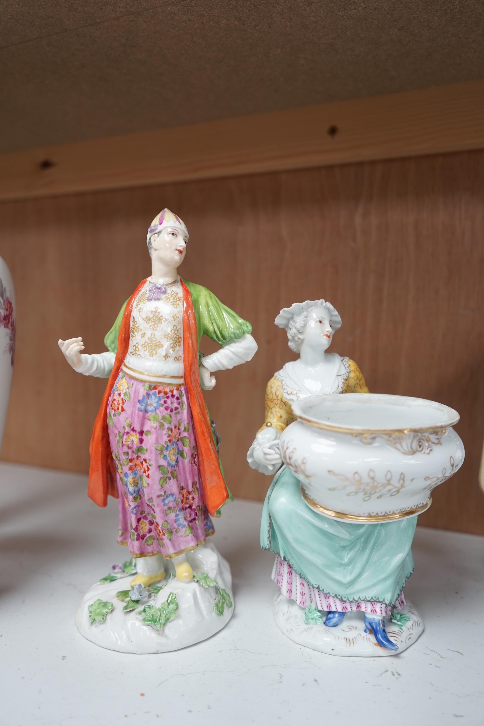 A group of various ceramics to include a Berlin floral decorated vase, a pair of Meissen dishes, similar box and cover, figural sweetmeat and figure of a Turk, together with a pair of Japanese Imari dishes, tallest 33cm.